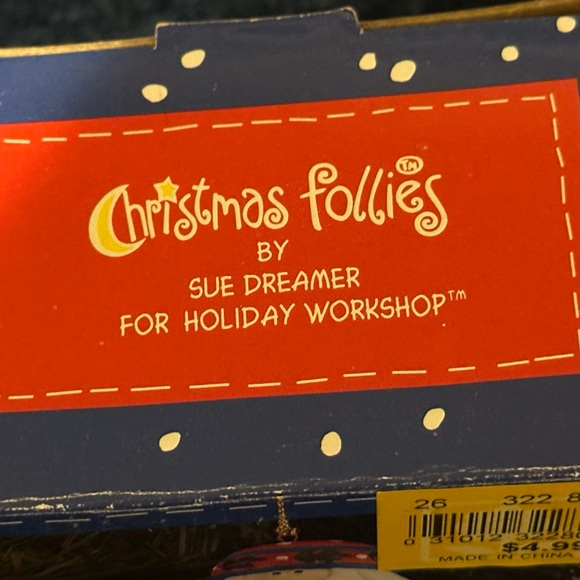 Brightly colored ceramic Santa ornament. Santa carries a tree & wreath. - Picture 10 of 10